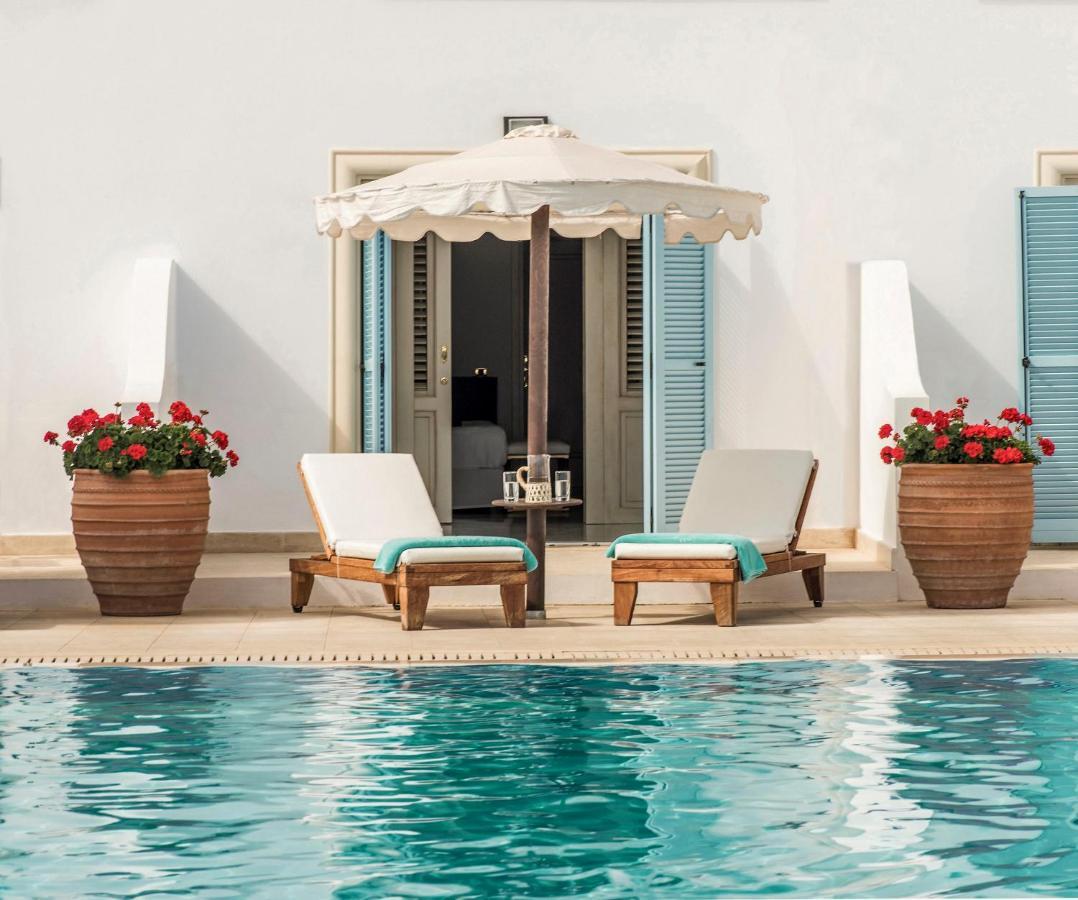มิตซิส ลากูนา รีสอร์ต แอนด์ สปา Hotel แอร์ซอนิสซอส ภายนอก รูปภาพ A pool at the hotel